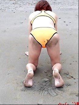 Japanese crossdresser in swimsuit number three.