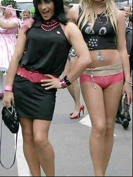 Shemale mistresses are posing naked on camera